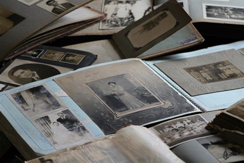 an image of many open old photo albums
